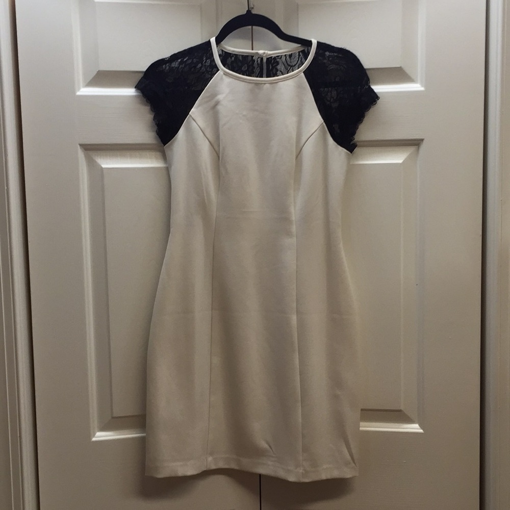 White dress with black lace sleeves